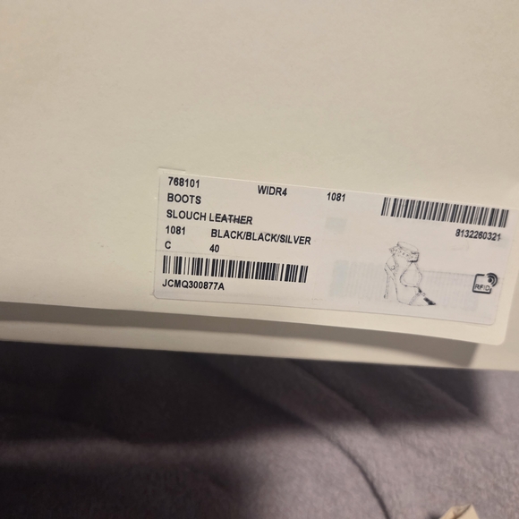 Alexander McQueen Black Leather Ankle Boots with Silver Accents - Picture 9 of 9